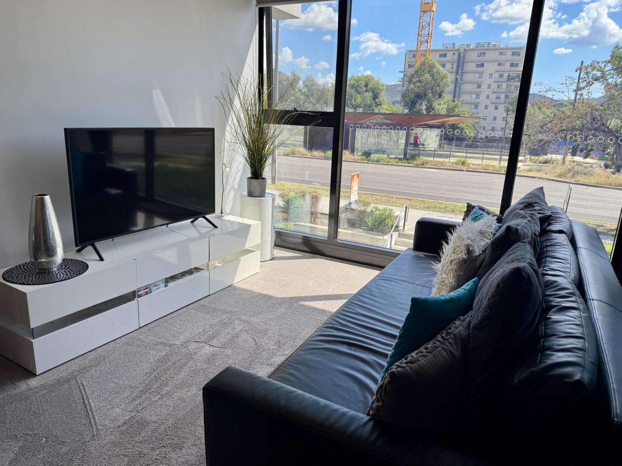 Midnight Luxe: Chic Braddon With Pool And Sauna Apartment Canberra
